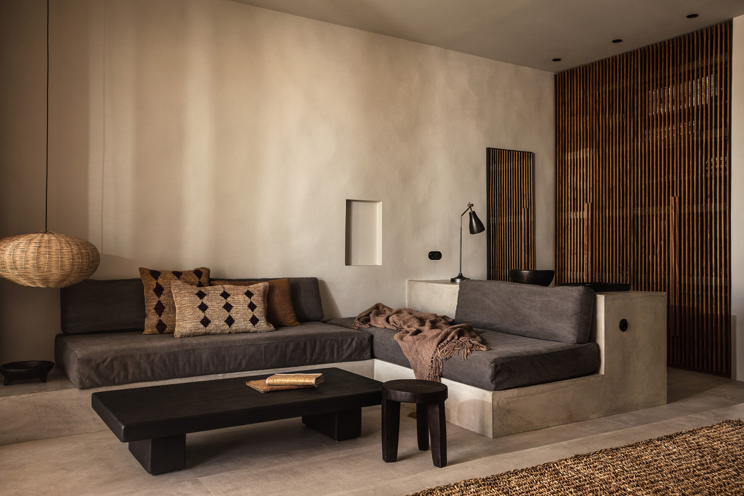 The range of accommodations and guest rooms at OKU Kos include Junior Suites which have a separate living area and lounge space with nature inspired interiors, overlooking a private terrace that opens to a shared pool