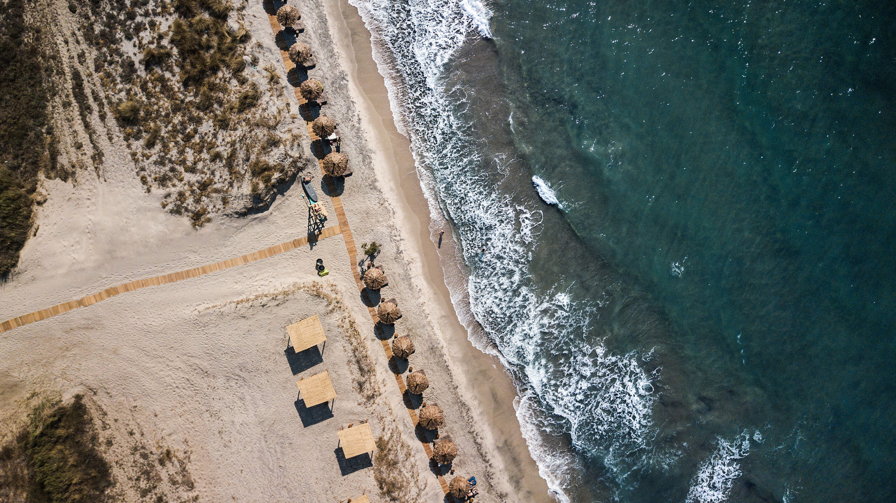 OKU Kos luxury hotel private beach seafront Greek Islands adults-only sunbeds cabanas