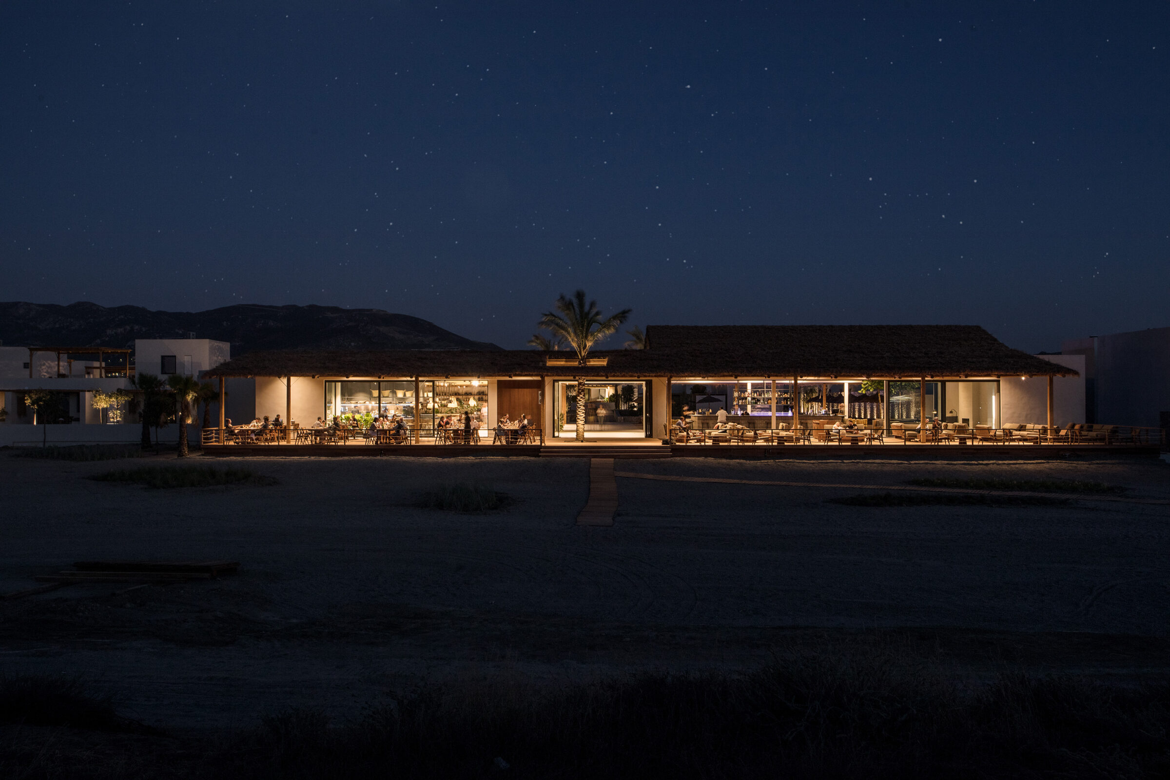 OKU Kos five-star-luxury adults-only hotel evening restaurant view starry skies